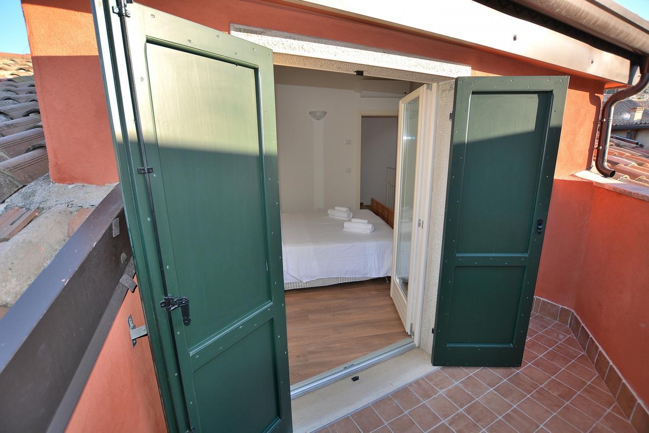 Apartment Del Pescatore ตอร์รีเดลเบนาโก ภายนอก รูปภาพ